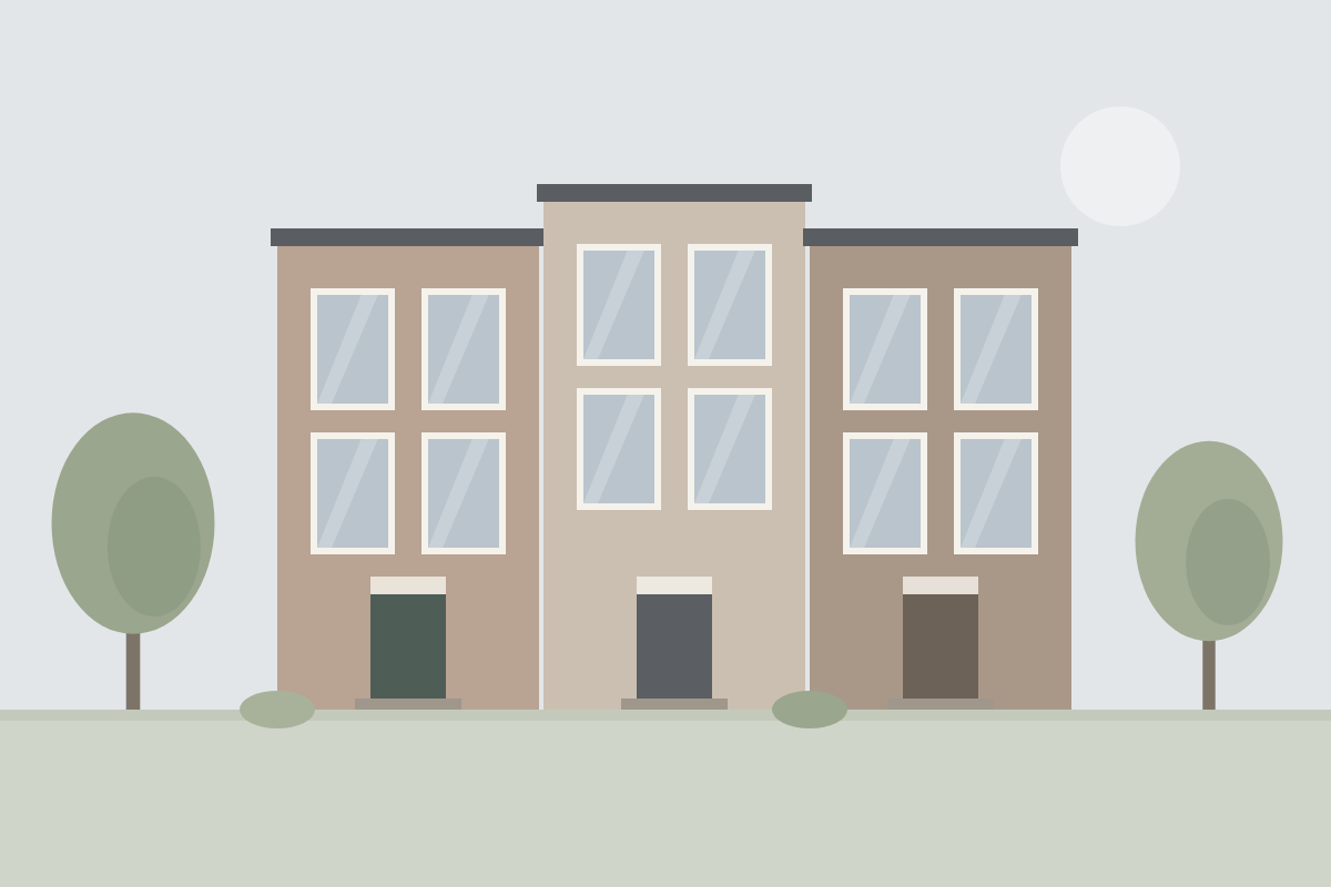 Row of three brick townhouses with tall windows
