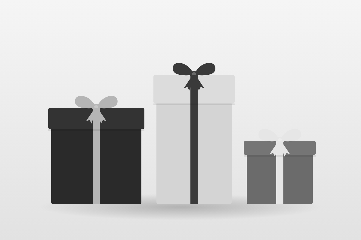 Three wrapped gift boxes with ribbons and bows