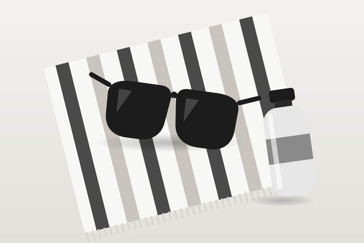 Sunglasses and a water bottle on a striped beach towel